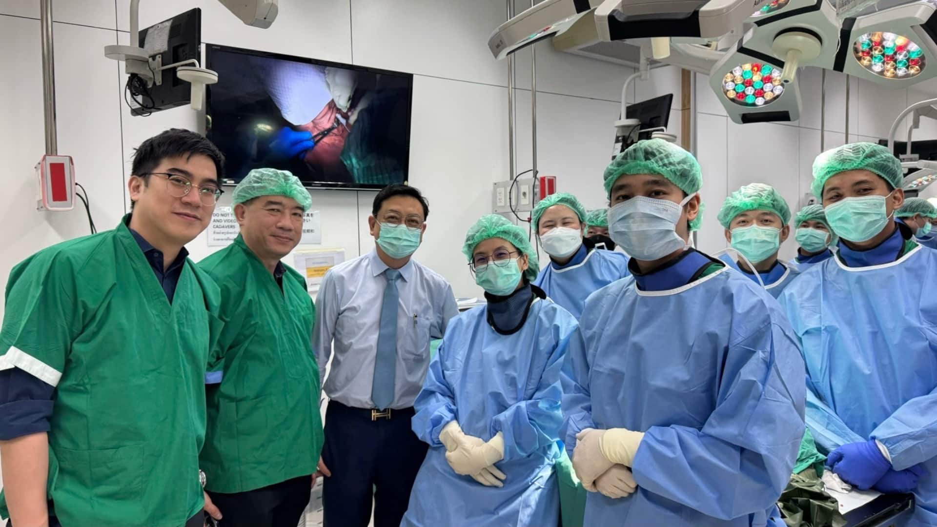 Spine Fellowship cadaveric workshop, surgeons and medical staff in operating room training session