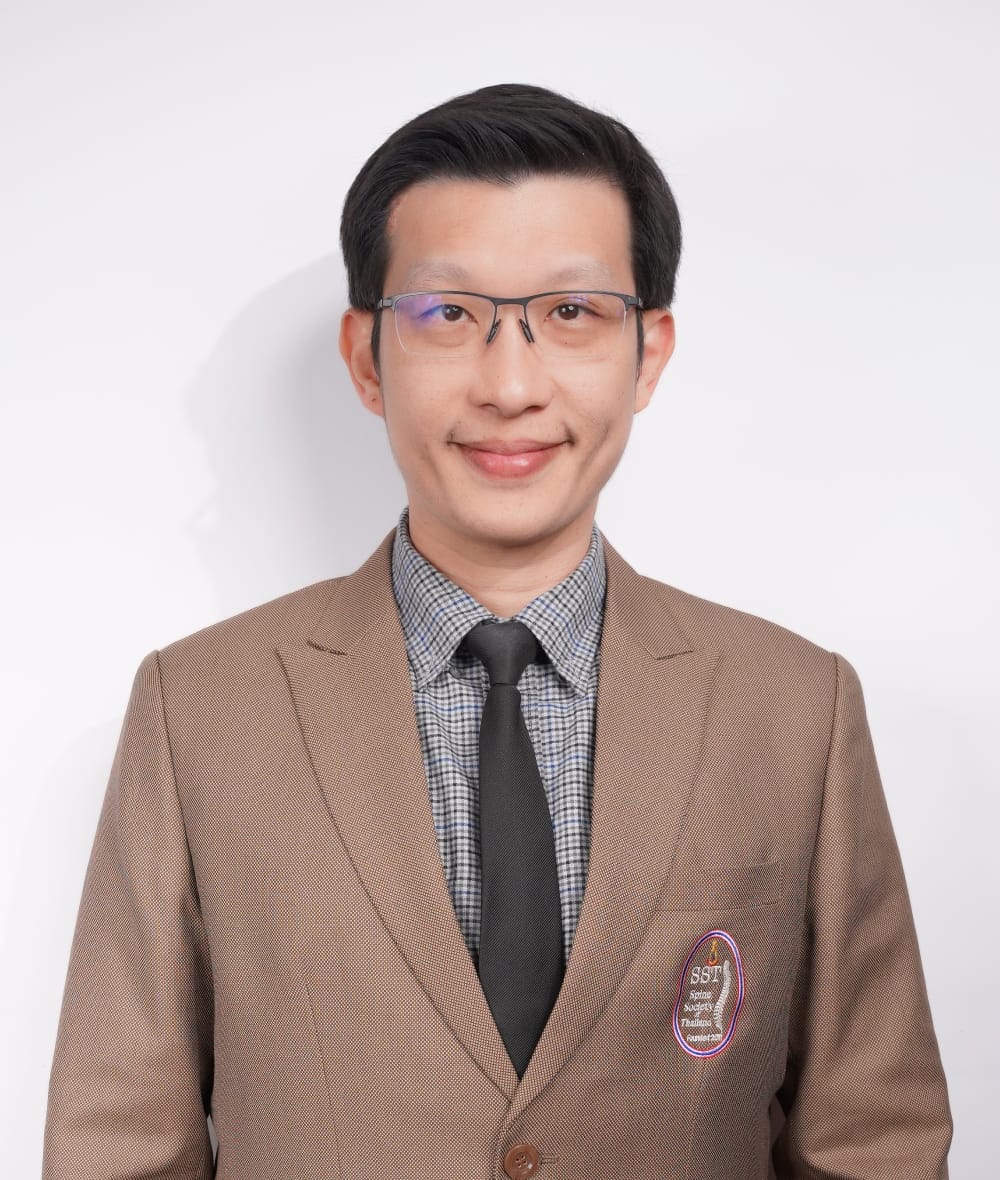 กระดูกสันหลัง กรรมการบริหารปัจจุบัน: ชายสวมสูทสีน้ำตาลอ่อนยิ้ม ออร์โธปิดิกส์